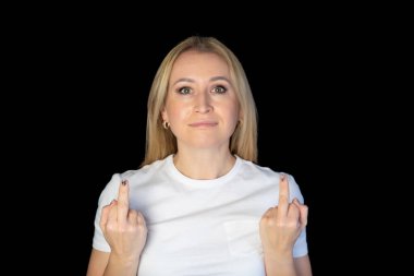 Closeup cropped portrait of nervous cheeky annoyed blonde woman showing teeth gesturing two fuck off signs with middle finger isolated on blue background