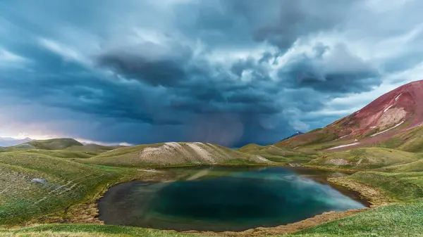 stock image Beautiful view of Tulpar Kul lake in Kyrgyzstan during the storm