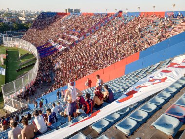 BUENOS AIRES, ARGENTINA - CIRCA MARCH 2023: Fans at the CA San Lorenzo de Almagro stadium in Buenos Aires circa March 2023 in Buenos Aires. clipart