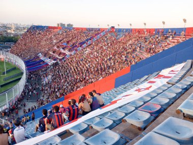 BUENOS AIRES, ARGENTINA - CIRCA MARCH 2023: Fans at the CA San Lorenzo de Almagro stadium in Buenos Aires circa March 2023 in Buenos Aires. clipart