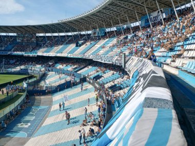 BUENOS AIRES, ARGENTINA - CIRCA MARCH 2023: Fans at the Racing Club de Avellaned clipart