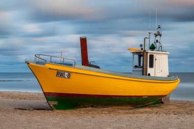 Fishing boat on the beach in Rewal circa August 2021 in Rewal. clipart