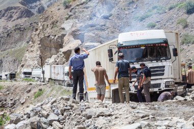 KHOROG, TAJIKISTAN - CIRCA JUNE 2017: The road from Khorog to Dushanbe along the Panj River circa June 2017 in Khorog. clipart