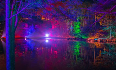 Illuminations around the lake at Blue Pool in Dorset