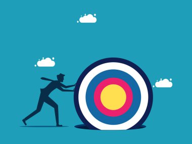 İş hedefleri. İş adamı hedefini delik vektörüne sıkıştırmak için çok çalışıyor