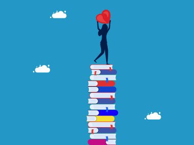 Okumayı ya da bilgi bulmayı severim. Kalbi yüksek kitap yığınının üzerinde tutan kadın.