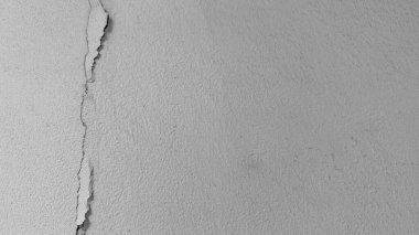 Beyaz duvar dokusu, çatlamış beton duvar.