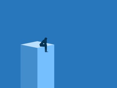 Üzüntü, ıstırap, iş adamı zirvede oturuyor.