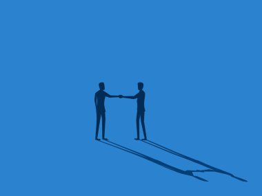 İş adamları el sıkışıyor ve boş alanlarda anlaşmalar yapıyor.