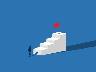 İş adamı başarı hedefine doğru merdivenlerden çıkar.