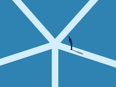 Businessman confused when looking at many paths