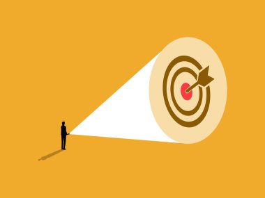 İş adamı bir hedefe el feneri tutuyor.