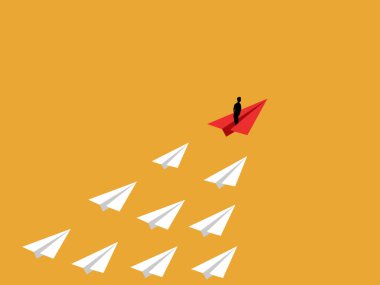 İşadamı gruba önderlik etmek için kırmızı kağıt uçak kullanıyor.