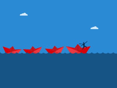 İşadamları lideri kağıt teknede önderlik ediyor.