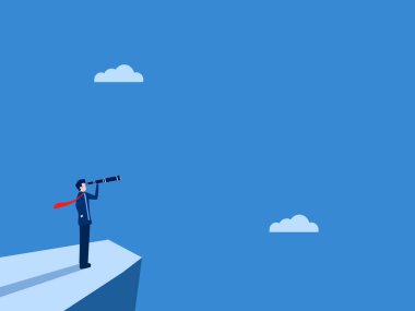 Uçurumdan teleskopla bakan bir iş adamı