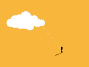 İş adamı bir başarı bulutu tutuyor, bir hedefi ve ilhamı var.