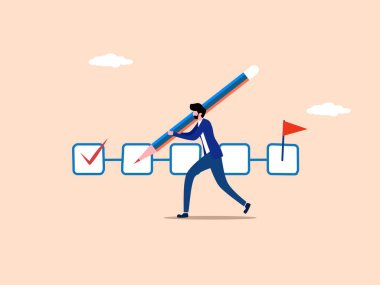 İş adamı, işin hedeflere göre tamamlanıp tamamlanmadığını kontrol etmek için bir kalem kullanır.