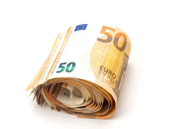 白色背景下的50欧元钞票卷的特写 图库照片