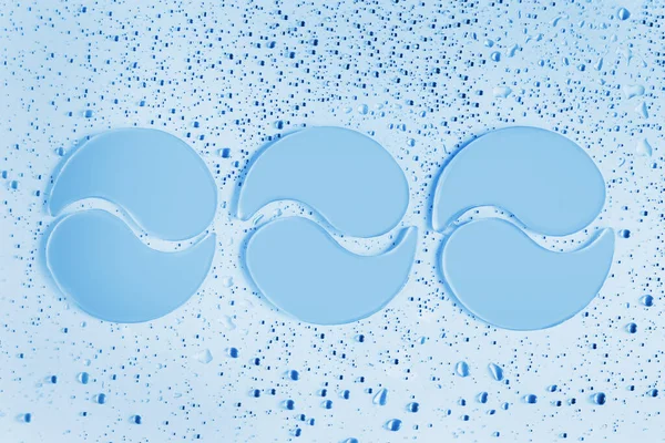 Τρία Ζεύγη Μπλε Επιθεμάτων Κολλαγόνου Υδρογέλης Ελαφρύ Φόντο Σταγόνες Ομορφιά — Φωτογραφία Αρχείου