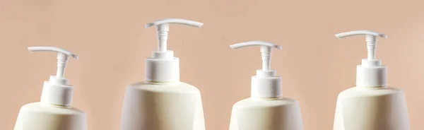 Plastic Bottles Liquid Soap Dispenser Pumps Beige Background — Stock Photo, Image