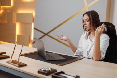 Angry stressed young business woman annoyed with computer problem, office worker hates stuck laptop, sad lady frustrated about bad online news, data loss, software failure