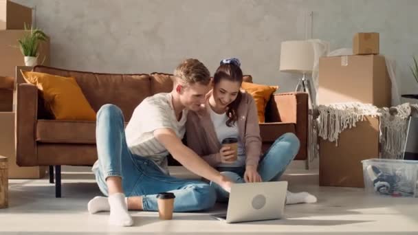 Couple New Home Using Laptop Drinking Coffee Couple Using Laptop — Video
