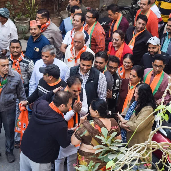 stock image New Delhi, India, November 20 2022 - Bharatiya Janata Party (BJP) supporters during a rally in support of BJP candidate Pankaj Luthra to file nomination papers ahead of MCD local body Elections 2022