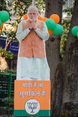 New Delhi, India - January 16 2023 - Prime Minister Narendra Modi cut out during BJP road show, the statue of PM Modi while attending a big election rally in the capital