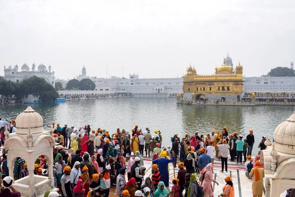 stock image Amritsar, India - February 26 2023 - Unidentified devotees from various parts at Golden Temple (Harmandir Sahib) in Amritsar, Punjab, India, Famous indian sikh landmark, Golden Temple