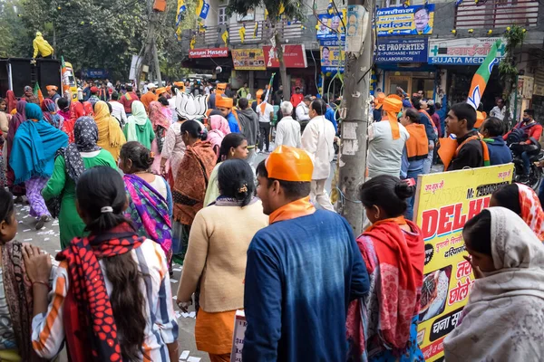 stock image Delhi, India, December 02 2022 -Bharatiya Janata Party (BJP) supporter during mega road show in support of BJP candidate Pankaj Luthara to file nomination papers ahead of MCD local body Elections 2022