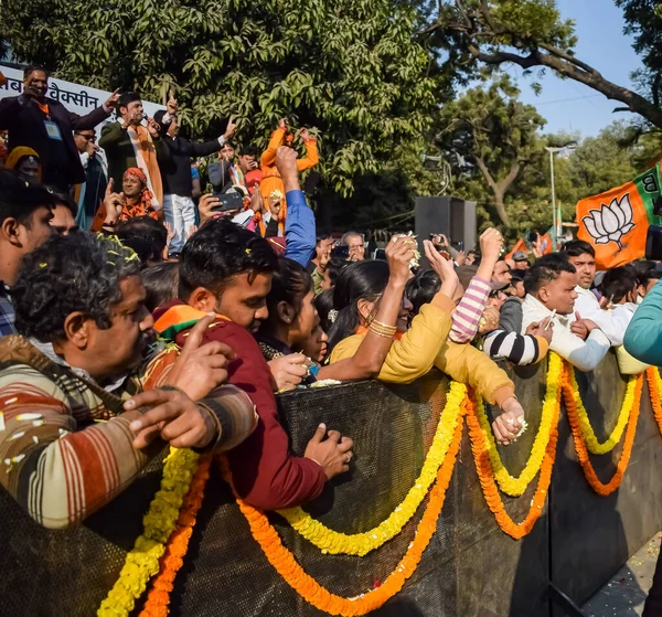 stock image New Delhi, India - January 16 2023 - Thousands of people collected during Prime Minister Narendra Modi BJP road show, people during PM Modi big election rally in the capital