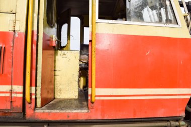 View of Toy train coach from the middle of railway track during daytime near Kalka railway station in India, Toy train coach view, Indian Railway junction, Heavy industry