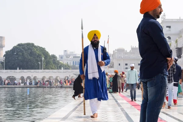 stock image Amritsar, India - February 26 2023 - Unidentified devotees from various parts at Golden Temple (Harmandir Sahib) in Amritsar, Punjab, India, Famous indian sikh landmark, Golden Temple