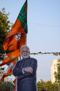 New Delhi, India - January 16 2023 - Prime Minister Narendra Modi cut out during BJP road show, the statue of PM Modi while attending a big election rally in the capital