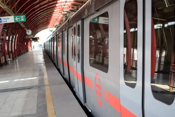 stock image New Delhi India, August 10 2023 - Delhi Metro train arriving at Jhandewalan metro station in New Delhi, India, Asia, Public Metro departing from Jhandewalan station