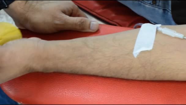 Blood Donor Blood Donation Camp Held Bouncy Ball Holding Hand — 图库视频影像