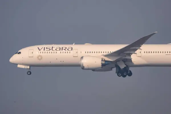 stock image New Delhi, India, December 25 2023 - Vistara Airbus A320 neo take off from Indra Gandhi International Airport Delhi, Vistara domestic aeroplane flying in the blue sky during day time