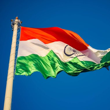 India flag flying high at Connaught Place with pride in blue sky, India flag fluttering, Indian Flag on Independence Day and Republic Day of India, tilt up shot, Waving Indian flag, Har Ghar Tiranga clipart
