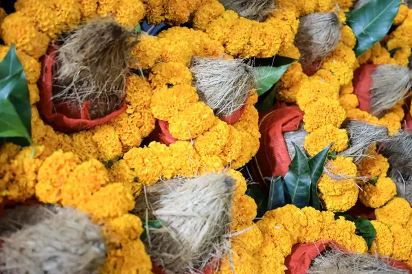 Stock image Kalash with coconut and mango leaf with floral decoration earthen pots containing sacred water. Kalash for hindu puja during Jagannath Temple Mangal Kalash Yatra, front view, closeup