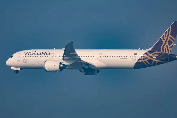 stock image New Delhi, India, May 10 2024 - Vistara Airbus A320 neo take off from Indra Gandhi International Airport Delhi, Vistara domestic aeroplane flying in the blue sky during day time