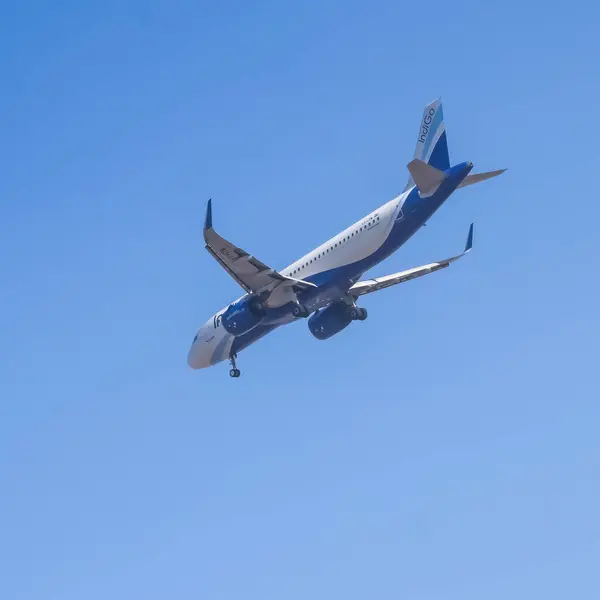 Stock image New Delhi, India, June 10 2024 - Indigo Airbus A320 take off from Indra Gandhi International Airport Delhi, Indigo domestic aeroplane flying in the blue sky during day time