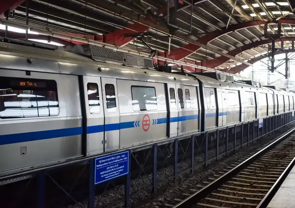 Stock image New Delhi, India, June 12 2024 - Delhi Metro train arriving at Jhandewalan metro station in New Delhi, India, Asia, Public Metro departing from Jhandewalan station