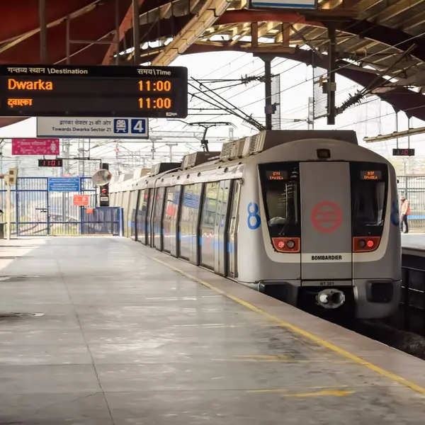 Stock image New Delhi, India, June 12 2024 - Delhi Metro train arriving at Jhandewalan metro station in New Delhi, India, Asia, Public Metro departing from Jhandewalan station