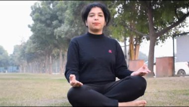 Young Indian woman practicing yoga outdoor in a park. Beautiful girl practice basic yoga pose. Calmness and relax, female happiness. Basic Yoga poses outdoor 