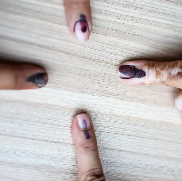 stock image Young voter showing her ink-marked fingers after casting votes near polling booth of east Delhi, India for general Lok Sabha Elections 2024