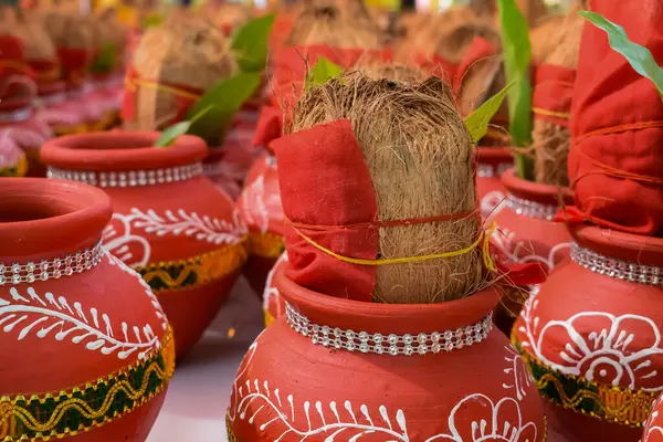 Stock image Kalash with coconut and mango leaf with floral decoration earthen pots containing sacred water. Kalash for hindu puja during Jagannath Temple Mangal Kalash Yatra, front view, closeup