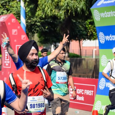 New Delhi, India - October 15 2023 - Vedanta Delhi Half Marathon race after covid in which marathon participants about to cross the finish line, Delhi Half Marathon 2023 clipart