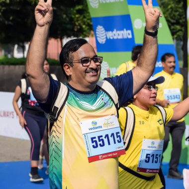 New Delhi, India - October 15 2023 - Vedanta Delhi Half Marathon race after covid in which marathon participants about to cross the finish line, Delhi Half Marathon 2023 clipart