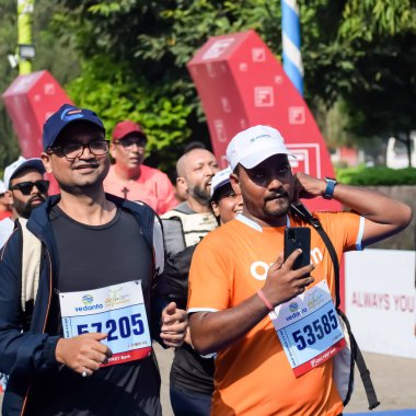 New Delhi, India - October 15 2023 - Vedanta Delhi Half Marathon race after covid in which marathon participants about to cross the finish line, Delhi Half Marathon 2023 clipart