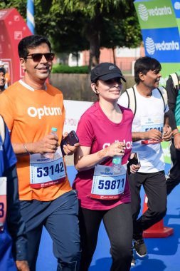 New Delhi, India - October 15 2023 - Vedanta Delhi Half Marathon race after covid in which marathon participants about to cross the finish line, Delhi Half Marathon 2023 clipart